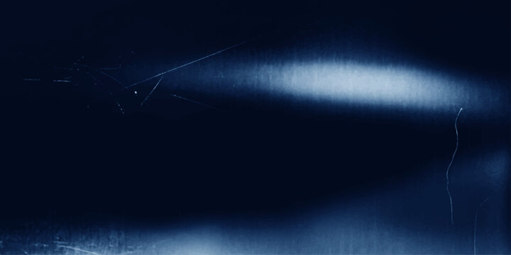 Dark blue metallic texture with subtle light streaks, suggesting a polished surface with fine scratches.