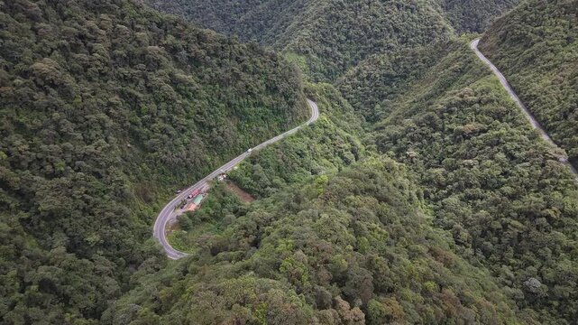 Aerial View of Cloud Forest and Mountain Road in Mindo Ecuador