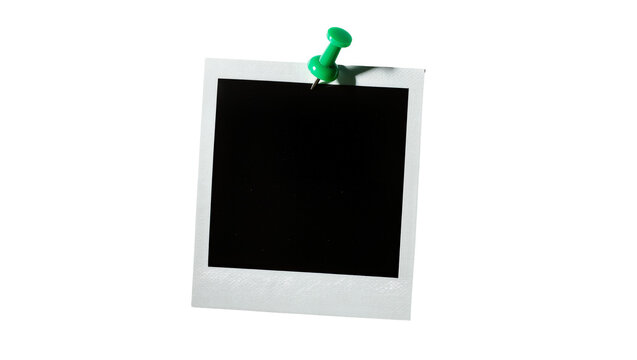 Blank white instant photo frame pinned with green pushpin, isolated on transparent background