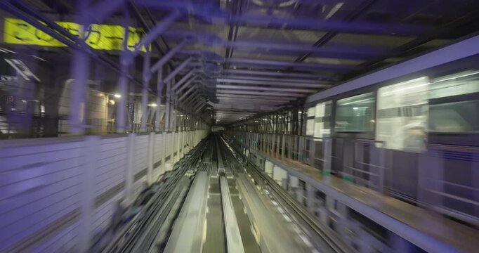 Train goes through city at night,  concept of speed