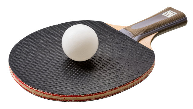 Table tennis paddle with white ball resting on rubber surface, isolated on transparent background