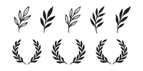 Set of black hand drawn floral leaves and laurel wreath branches for design decoration ©  creative  marlia