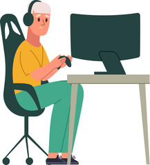 Senior man sitting at a desk and playing an electronic game with a controller © WinWin