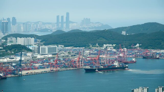 Cargo Ship Docking at Busan Port with Tugboat Assistance and Maritime Operations Timelapse