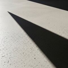 Fototapeta premium Warm spotlight shining on a dark textured floor or fabric. Dim stage lighting with a bright circle in the center and dark vignette edges.