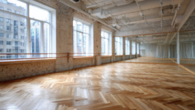 Spacious dance studio with hardwood floors, large windows, exposed brick walls, and mirrors