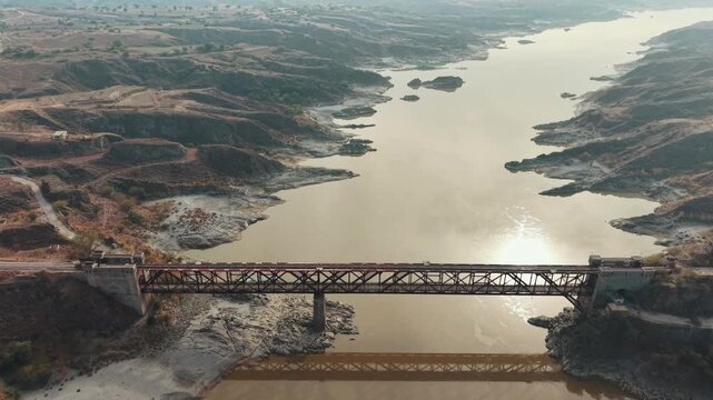 Khushal Garh  Railway bridge view from above Kohat city Khyber Pakhtunkhwa Pakistan. A historic dual-deck, steel truss bridge built in 1907 that crosses the Indus River.