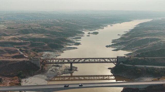 Khushal Garh  Railway bridge view from above Kohat city Khyber Pakhtunkhwa Pakistan. A historic dual-deck, steel truss bridge built in 1907 that crosses the Indus River.