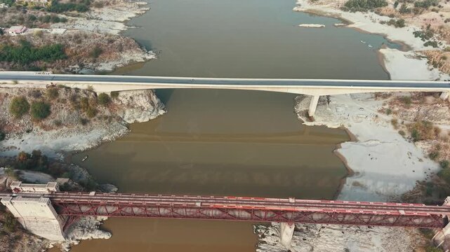 Khushal Garh  Railway bridge view from above Kohat city Khyber Pakhtunkhwa Pakistan. A historic dual-deck, steel truss bridge built in 1907 that crosses the Indus River.