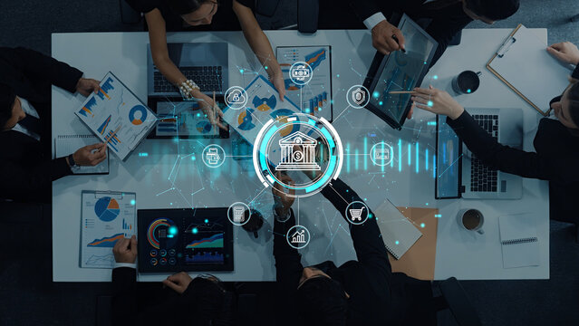Business Team Collaboration in Modern Office with Data Analysis and Financial Technology Integration Illustrating Partnership and Growth Strategies. Entropy.
