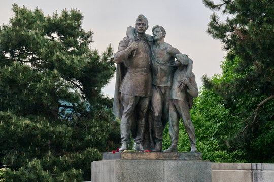 Statue of a soldier, a worker, and a young boy as part of a war memorial, Slavin Memorial, Bratislava, Slovakia, Europe.