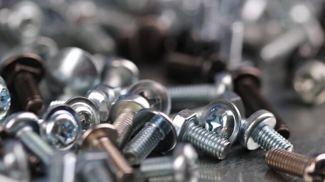 Metal screws for fastening equipment. Soft focus. Close-up. 
