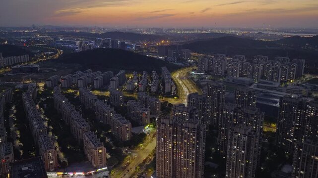 Aerial photography of urban landscapes and city skylines at sunset.