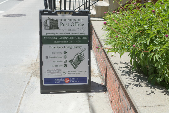 a-frame sidewalk sign outside Toronto's First Post Office located at 260 Adelaide St E