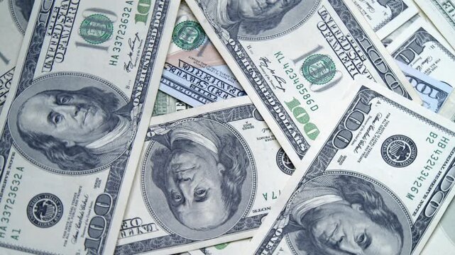 Luxurious greenbacks lay scattered in abundance, creating a vibrant display of wealth and potential. Countless opportunities await amid this cash-filled landscape