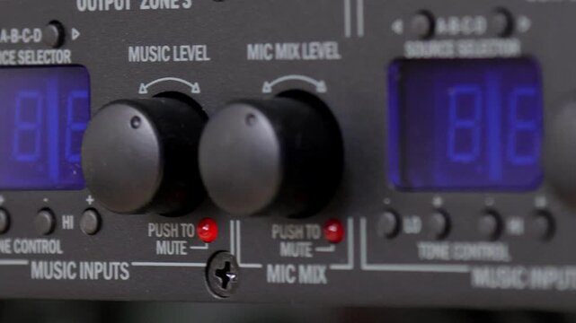 Front control panel of the audio amplifier with level controls and display. 