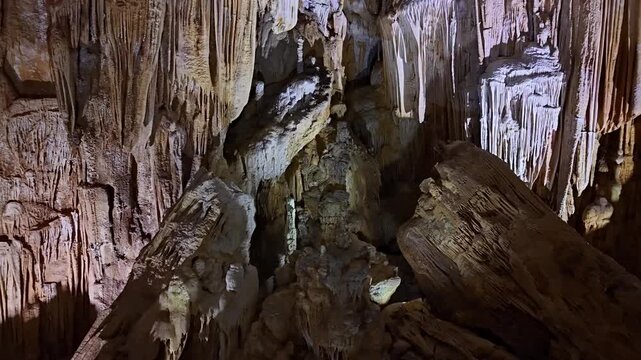Mystic Underground Cavern Scene. Dark Limestone Cavern Featuring Large Mineral Deposits And Shadows