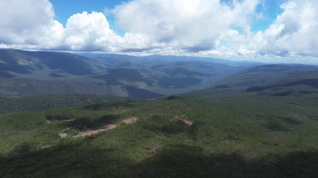 4k 30 fps drone shoot of mountains with clouds and valey 1
