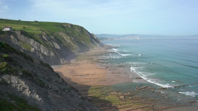 Scenic basque coast with flysch cliffs and ocean waves
