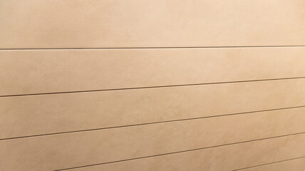 Fototapeta premium Minimalist Beige Wall Paneling with Modern Horizontal Linear Cladding Texture. Background