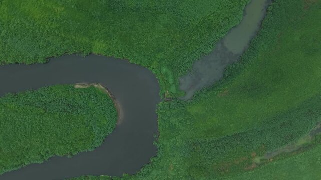 Oxbow Lake Confluence &ndash; High Top Down Forward Aerial Flight Over Two Waters