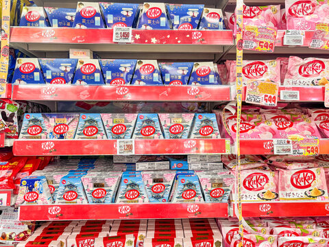 Osaka, Japan - April 26, 2026: Various kit kat candy flavors exclusive to Japan, displayed at a Don Quijote store