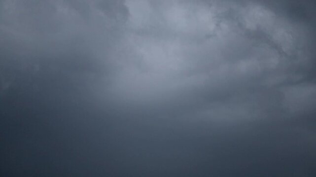 Heavy thunderstorm clouds with bright lightning flashes in the night sky - 180fps Captured in Cinematic High-Detail Footage