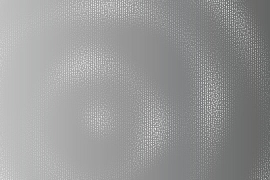 Close-up of halftone dotted pattern with gradient shading effect dots gray-scale