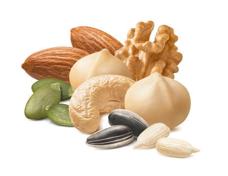 Almond, walnut, macadamia, cashew nut,  pumpkin and sunflower seeds isolated on white background.  Real photography