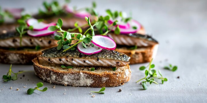 Freshly sliced salmon on bread garnished with radishes and herbs  