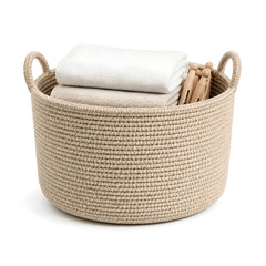 Obraz premium Round Woven Laundry Basket with Folded Towels and Wooden Pegs Isolated on White Background