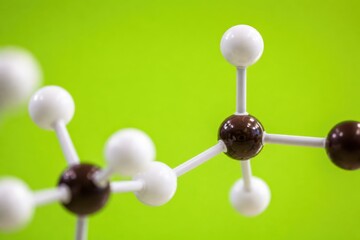 Obraz premium Abstract molecular model on bright green background for science research chemistry and biotechnology concept