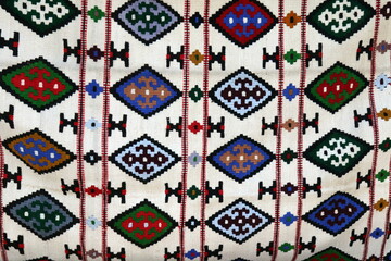 Obraz premium Traditional Balkan Geometric Patterned Woven Kilim Carpet Texture.