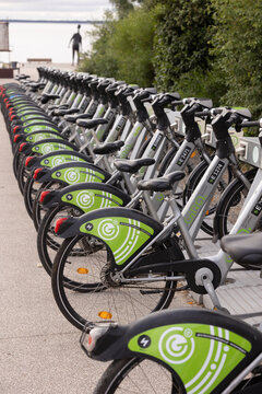 20260719 Lisboa, Portugal - Row of Gira public rental bicycles docked at a bike-sharing station in Lisbon, Portugal. Sustainable urban mobility solution promoting eco-friendly transportation, cycling