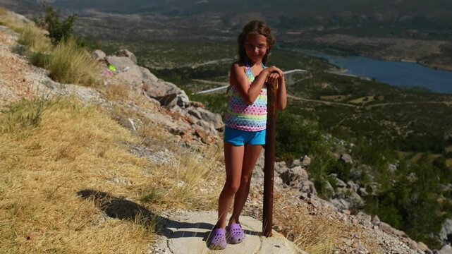 Little beautiful girl about Zrmanja in Croatia