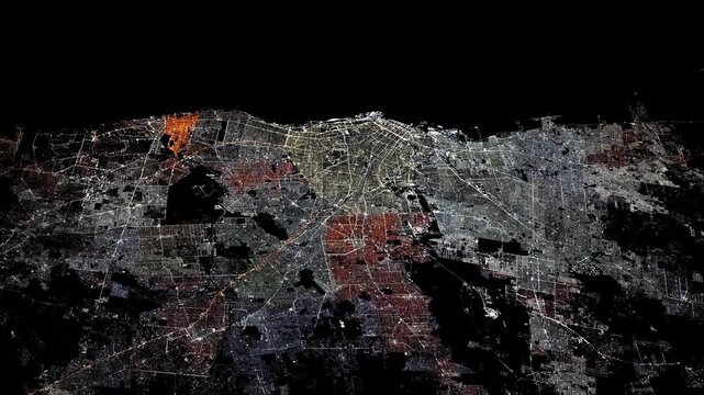 Flying over Buenos Aires city lights at night toward the coast satellite view from space based on Nasa imagery