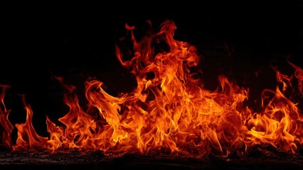 Fototapeta premium Intense Flames Burning Against Dark Background
