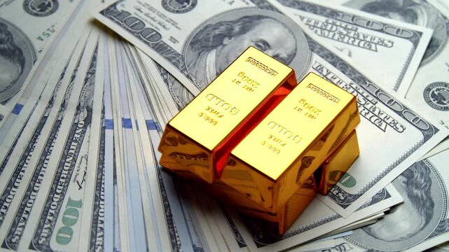 Shining gold bars are showcased on a pile of cash, symbolizing prosperity and success. A beautiful arrangement highlights the allure of wealth in a bright environment