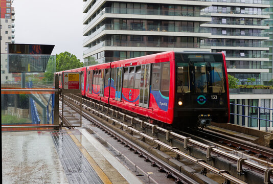 A Docklands Light Railway train approaches Heron Quays station in Canary Wharf, London, England