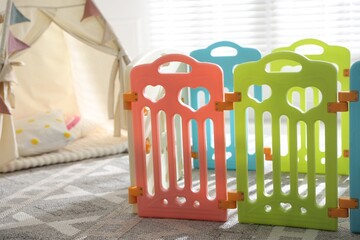 Beautiful playpen and wigwam in child's room, closeup © New Africa