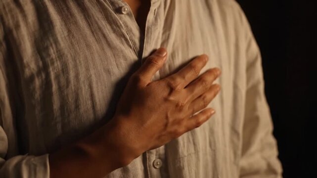 Hand Resting on Chest Expressing Emotion. 4K Video