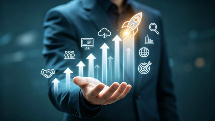 Fototapeta premium Business Growth and Startup Success Concept with Rocket Launch and Rising Financial Graph on Businessman Hand