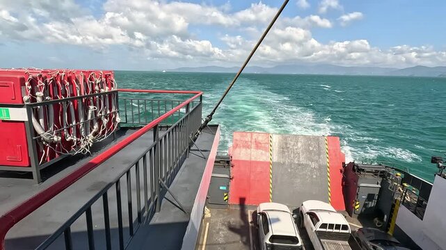 View from the upper deck of a loaded car ferry leaving Koh Samui island in Thailand