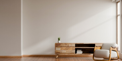 Obraz premium Minimalist living room interior design with comfortable armchair, wooden cabinet, and blank empty wall for home decoration mockup- 3D rendering