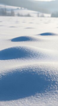 Aerial view of snowy mountain landscape with glacier.