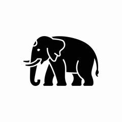 Fototapeta premium A minimalist black elephant silhouette walks on white background