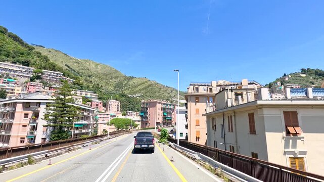 Driving Through a Scenic Italian Coastal Town with Colorful Buildings