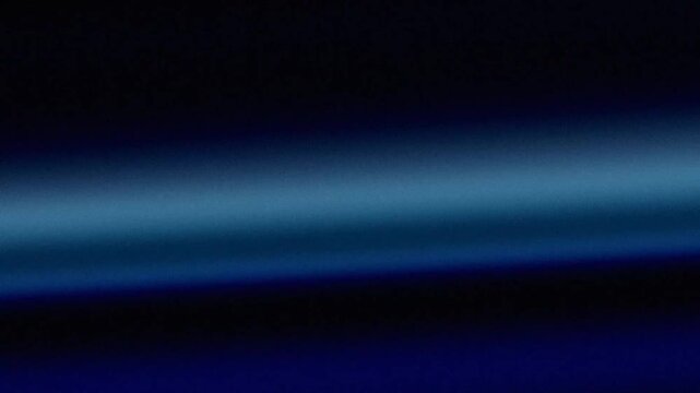 Minimalist abstract blue gradient bands moving softly across a dark digital space with cinematic film noise and atmospheric grain