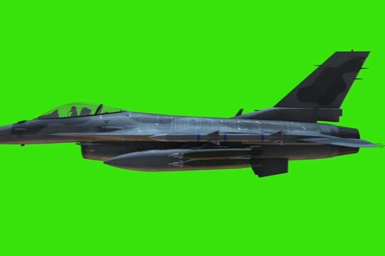Armed Military Fighter Jet on Green Screen Background for Chroma Key Compositing