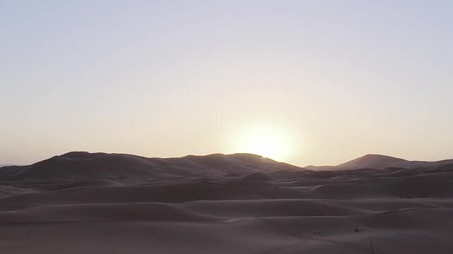 Sunset Over Sahara Desert Sand Dunes in Morocco